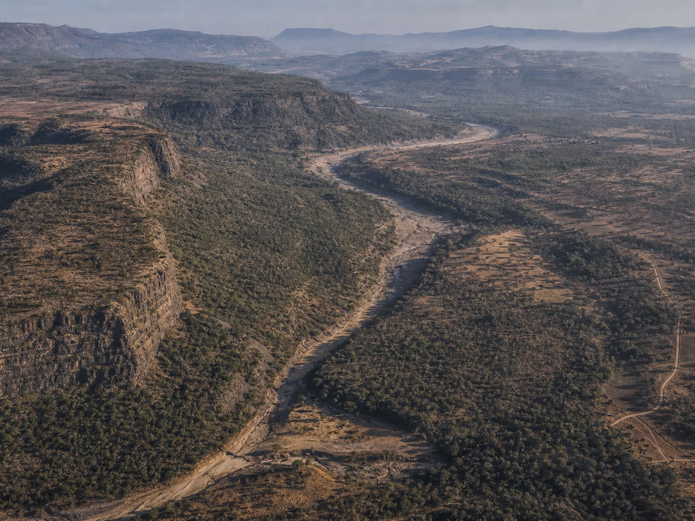 A clear morning view across a rugged Deccan Plateau corridor before operating conditions degrade.